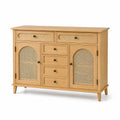 Buffet en bois clair avec portes en rotin et tiroirs